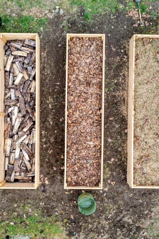 wooden containers with wood chips sawdust firewood and charcoal